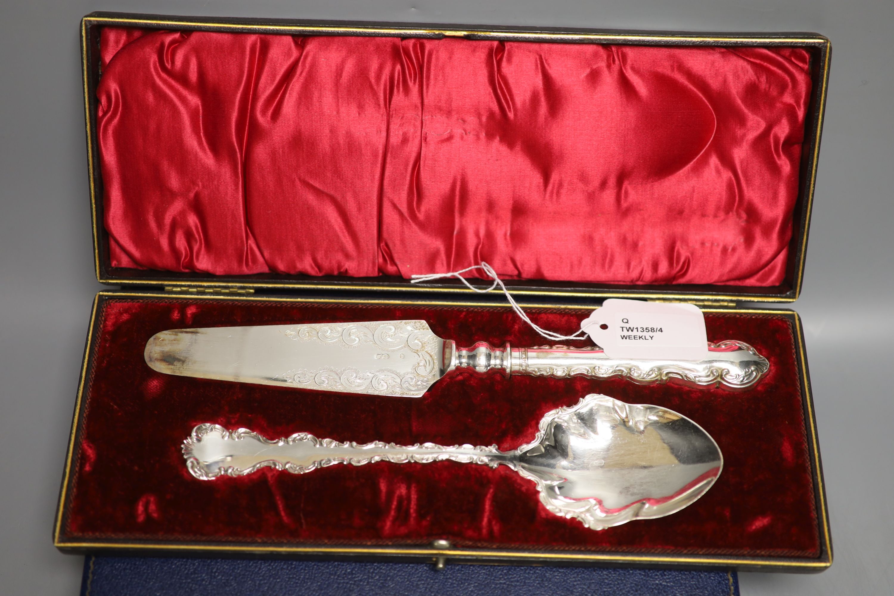 A silver-mounted amber cheroot holder, cased, with Russian inscription, Birmingham 1896 and sundry silver and plated flatware,